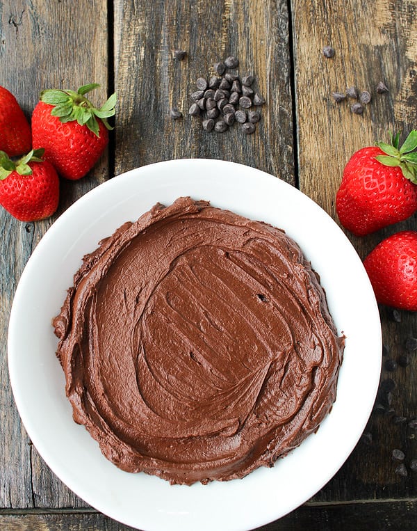 chocolate frosting in a white bowl. 